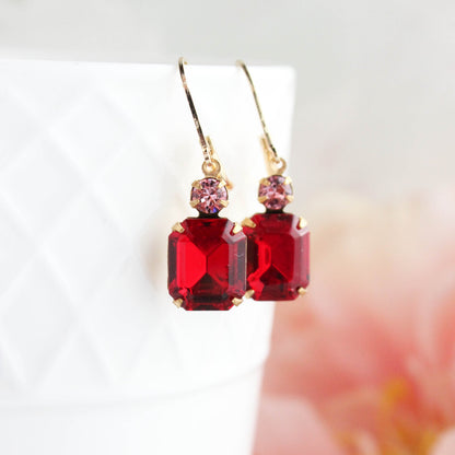 Ruby Red rectangle vintage glass earrings with gold hooks on a white background