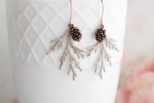 Load image into Gallery viewer, Cedar Branch Earrings | Sandstone Patina w antiqued rose gold cones