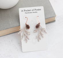 Load image into Gallery viewer, Cedar Branch Earrings | Sandstone Patina w antiqued rose gold cones