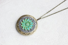 Load image into Gallery viewer, Sunflower Locket Necklace Antiqued Silver Floral Large Round Photo Locket Pendant Vintage Style Verdigris Patina Teal Flower Long Chain